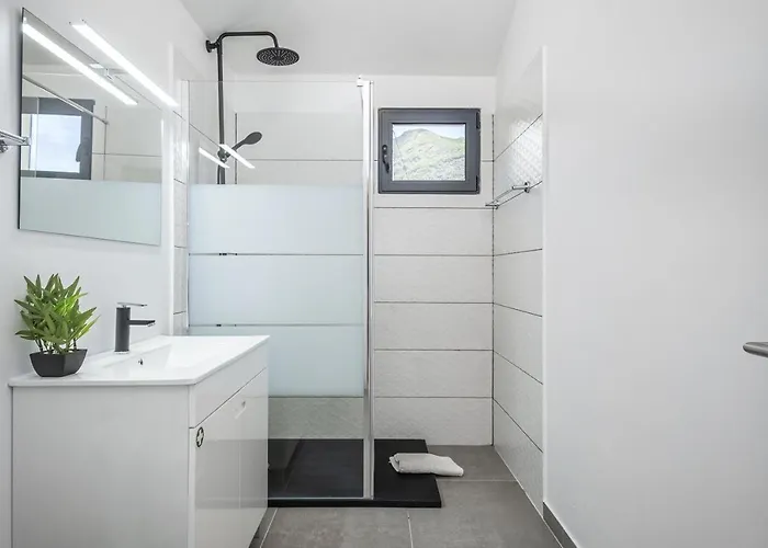 Basalt Dwelling Ii By Homie São Vicente